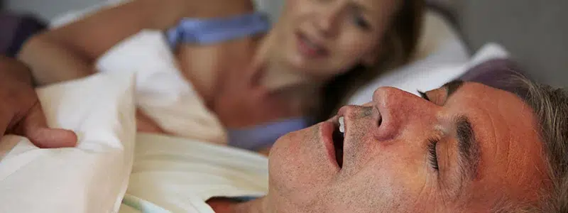 What causes snoring in some people