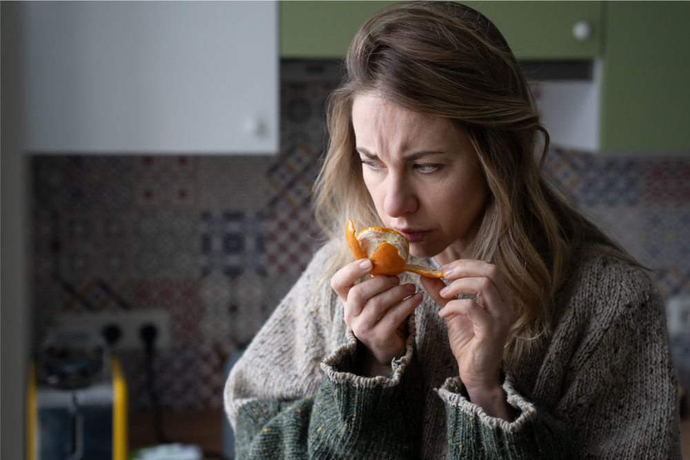 Woman smelling fruit - C/V ENT Surgical Group