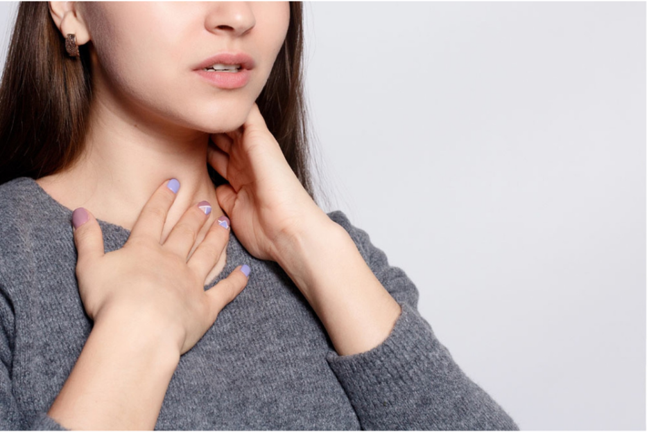 A person with her hand on